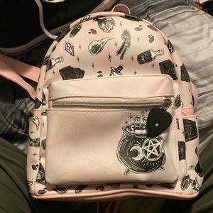 Loungefly pink witchcraft backpack